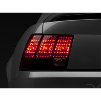 Raxiom 99-04 Ford Mustang Excluding 99-01 Cobra Tail Lights- Black Housing (Smoked Lens)