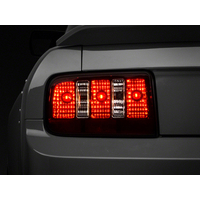 Raxiom 05-09 Ford Mustang Coyote Tail Lights- Blk Housing (Smoked Lens)