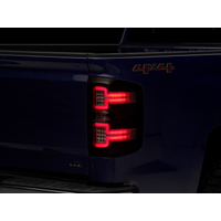 Raxiom 14-18 Chevrolet Silverado 1500 LED Taillights w/ SEQL Turn Signals- Blk Housing (Clear Lens)