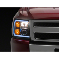 Raxiom 07-13 Chevrolet Silverado 1500 Axial Headlights w/ SEQL LED Bar- Blk Housing (Clear Lens)