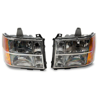 Raxiom 07-14 GMC Sierra 1500/2500 HD/3500 HD Axial OEM Rep Headlights- Chrome Housing (Clear Lens)