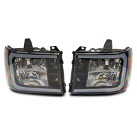 Raxiom 07-13 GMC Sierra 1500 Axial Series Headlights w/ LED Bar- Blk Housing (Clear Lens)