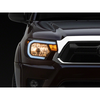 Raxiom 12-15 Toyota Tacoma Axial Series Headlights w/ LED Bar- Blk Housing (Clear Lens)