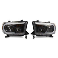 Raxiom 07-13 Toyota Tundra Axial Series Headlights w/ SEQL LED Bar- Blk Housing (Clear Lens)