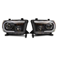 Raxiom 07-13 Toyota Tundra Axial Projector Headlights w/ SEQL LED Bar- Blk Housing (Clear Lens)