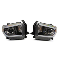 Raxiom 14-21 Toyota Tundra Axial Projector Headlights w/ SEQL LED Bar- Blk Housing (Clear Lens)